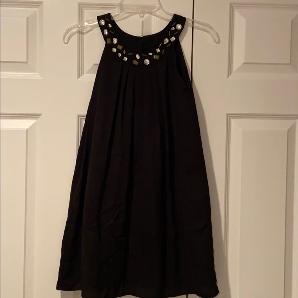 Blush dress for girls with beaded halter neck.